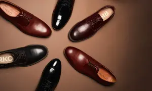 Eleganckie buty męskie Ryłko: czarne lakierki i brązowe półbuty. Idealne, by dobrać odpowiednie buty do czarnego garnituru.