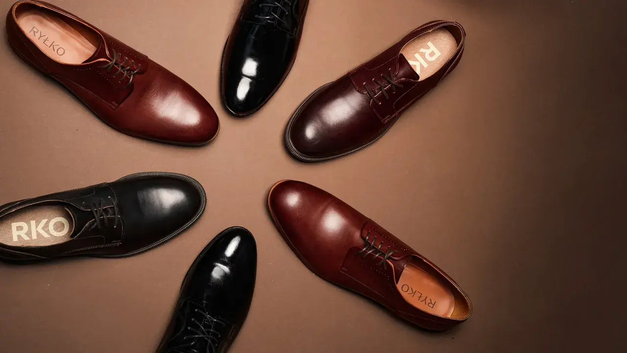 Eleganckie buty męskie Ryłko: czarne lakierki i brązowe półbuty. Idealne, by dobrać odpowiednie buty do czarnego garnituru.